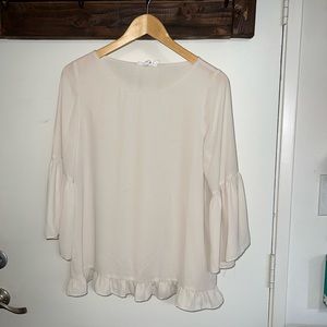 Pearl blouse with ruffle detail